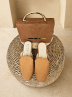 Slippers and clutch bag