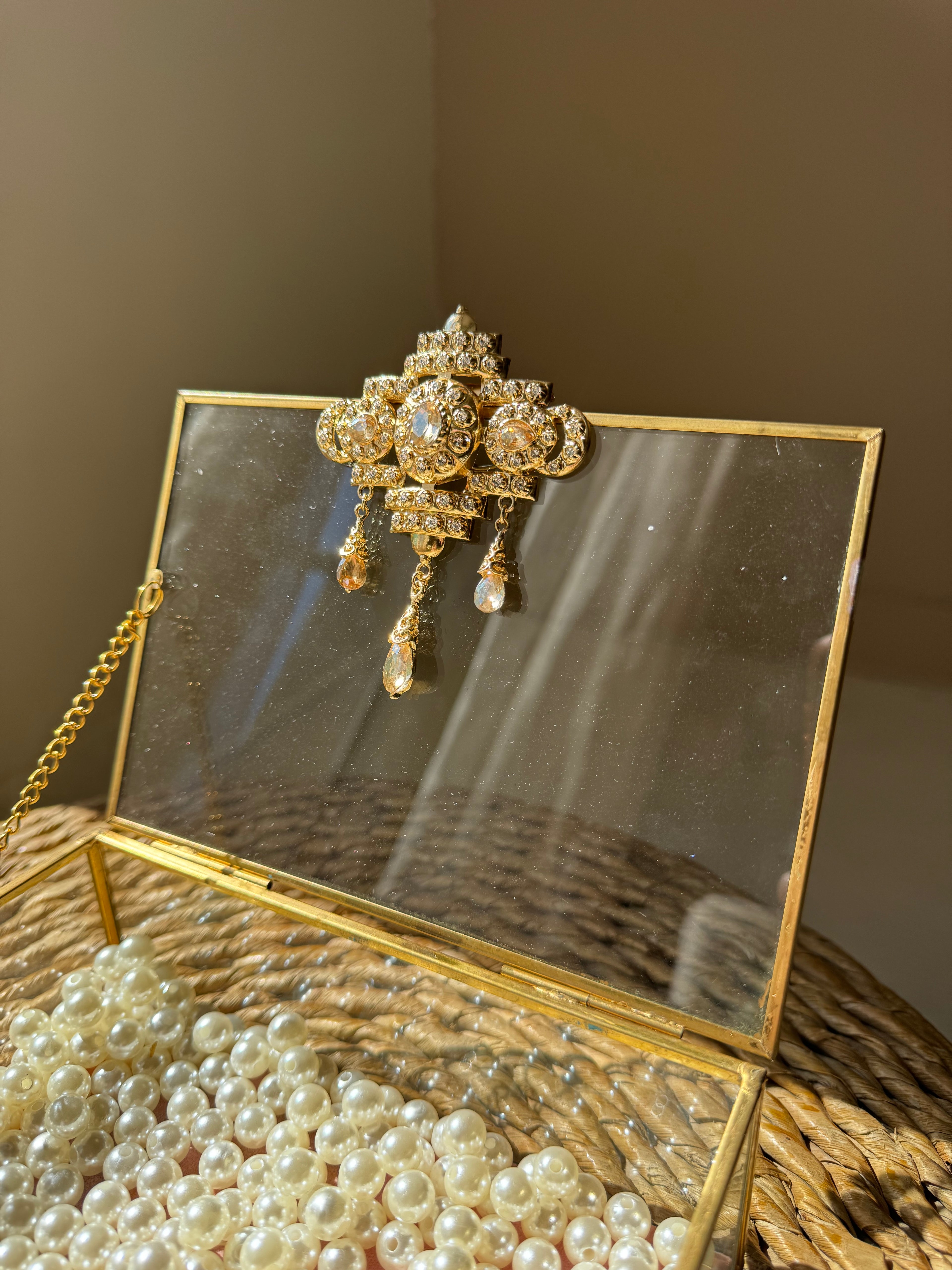 Broche bijou en acier dorée