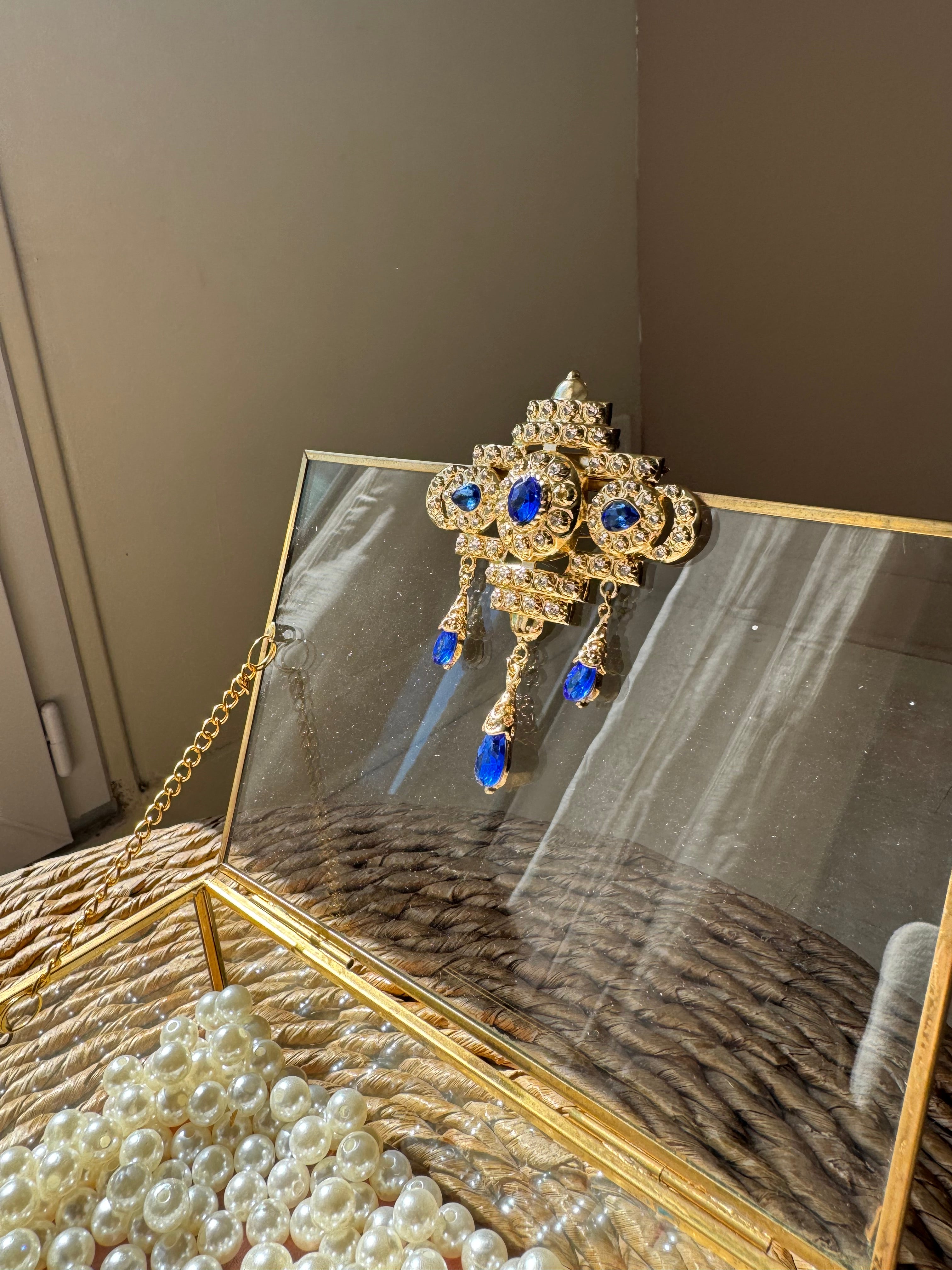 Broche bijou en acier dorée