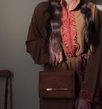 Slippers and clutch bag