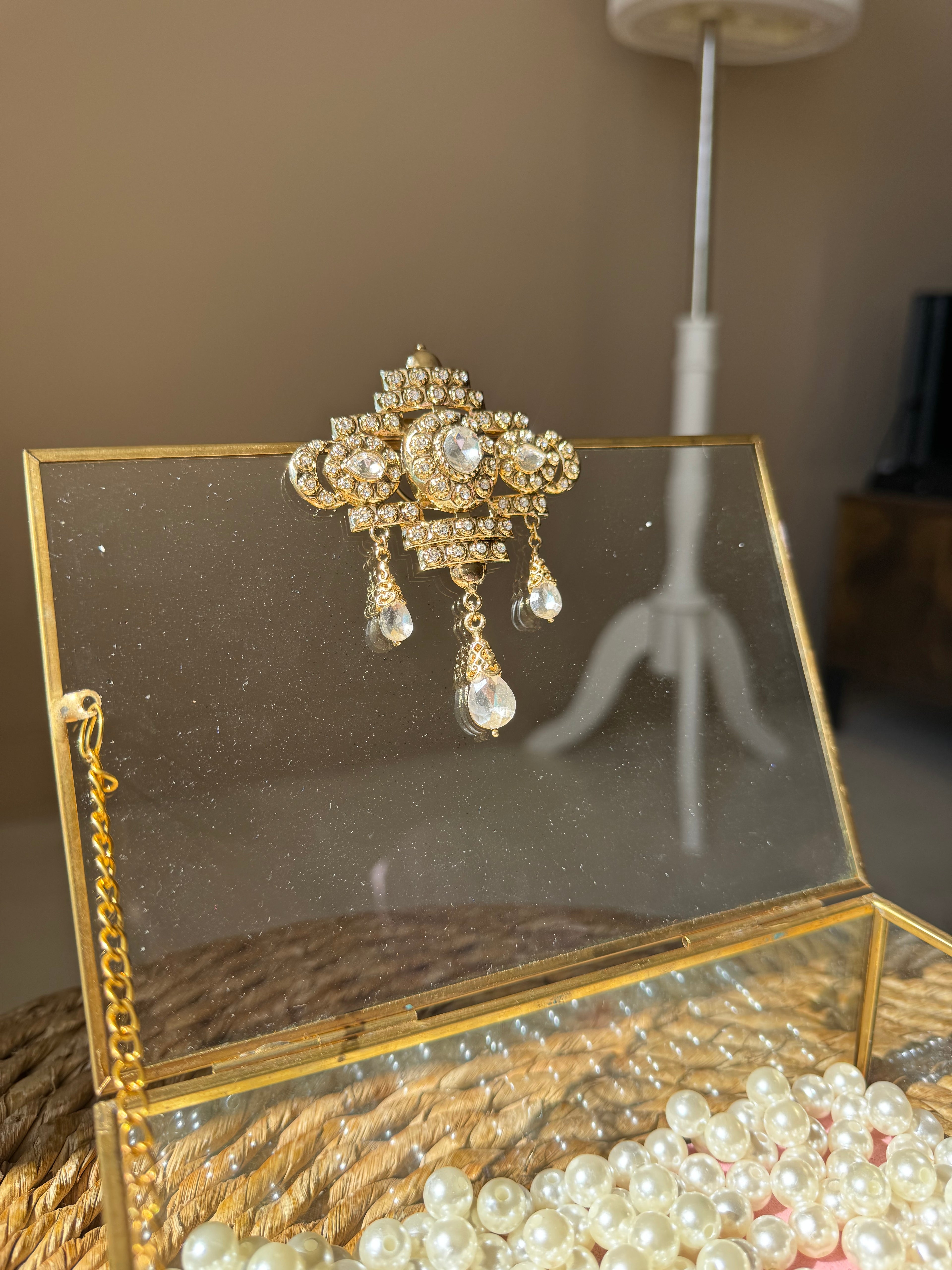 Broche bijou en acier dorée