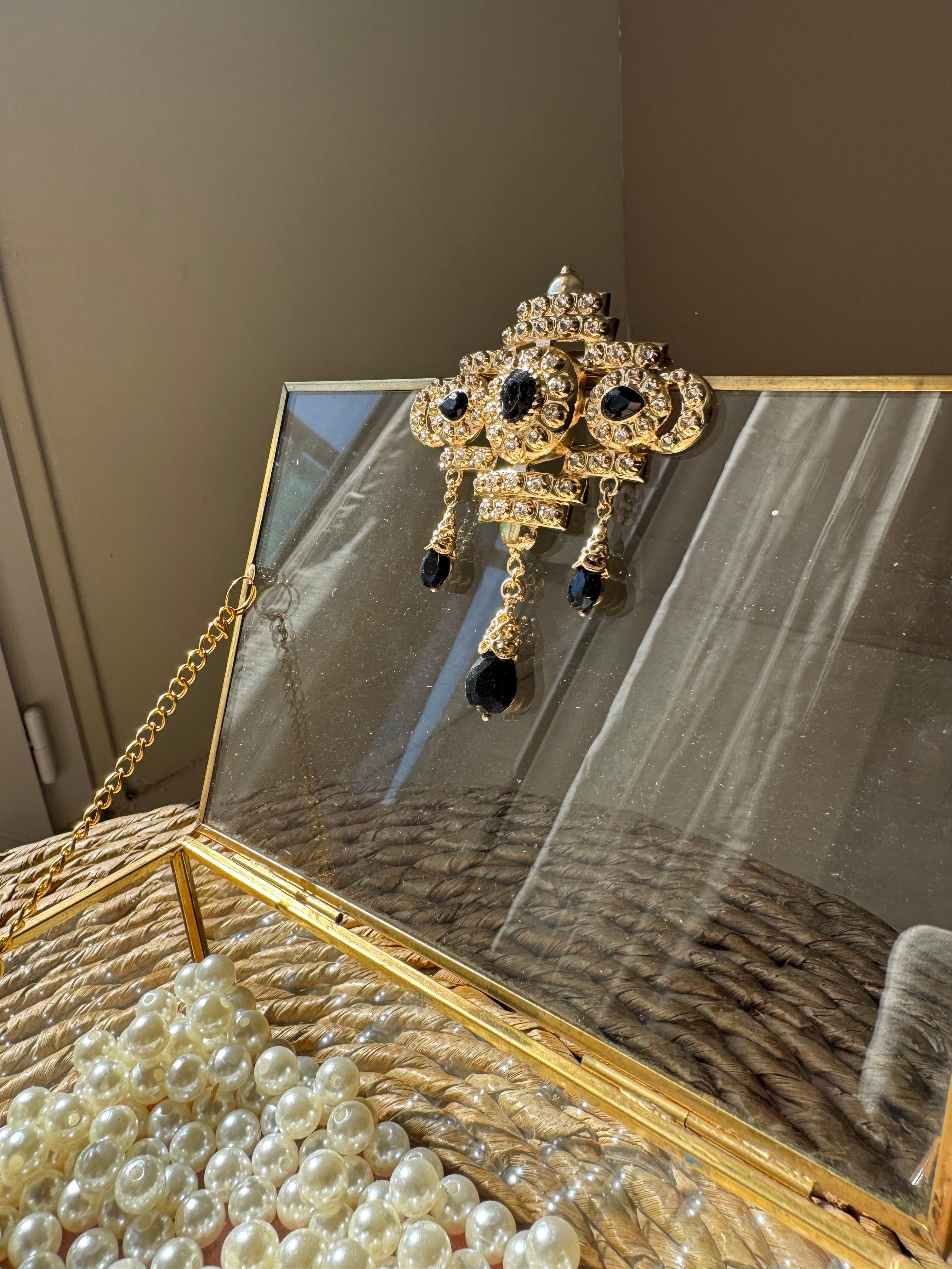 Broche bijou en acier dorée