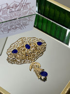 Gold-plated steel brooch