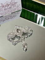 Gold-plated steel brooch