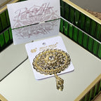 Gold-plated steel brooch