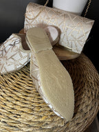 Slippers and clutch bag