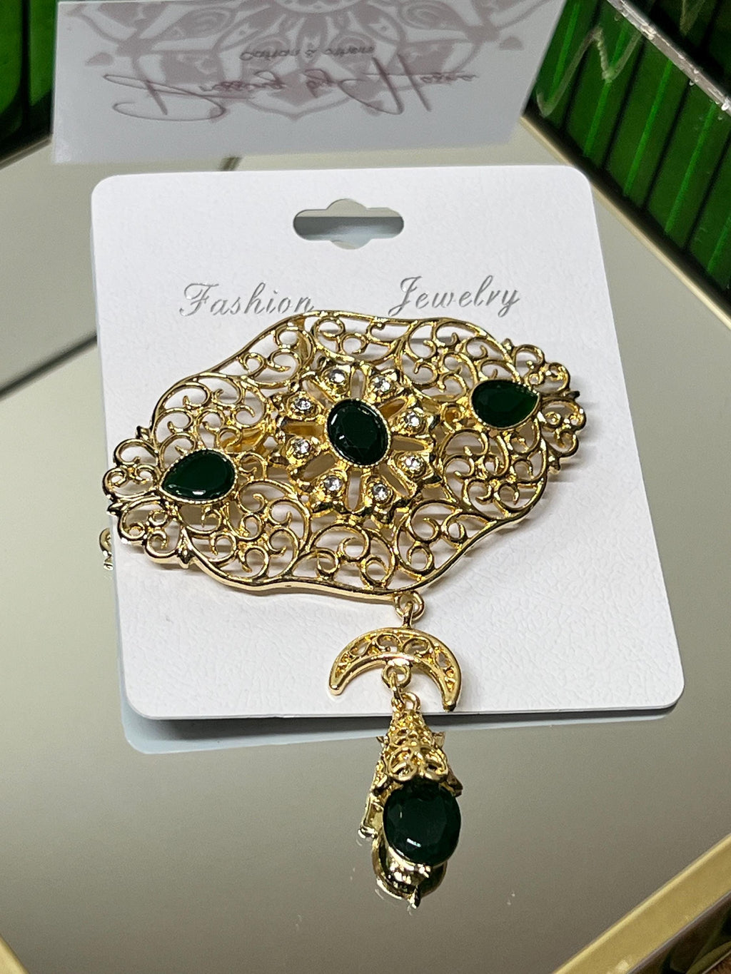 Gold-plated steel brooch