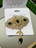 Gold-plated steel brooch