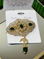 Gold-plated steel brooch